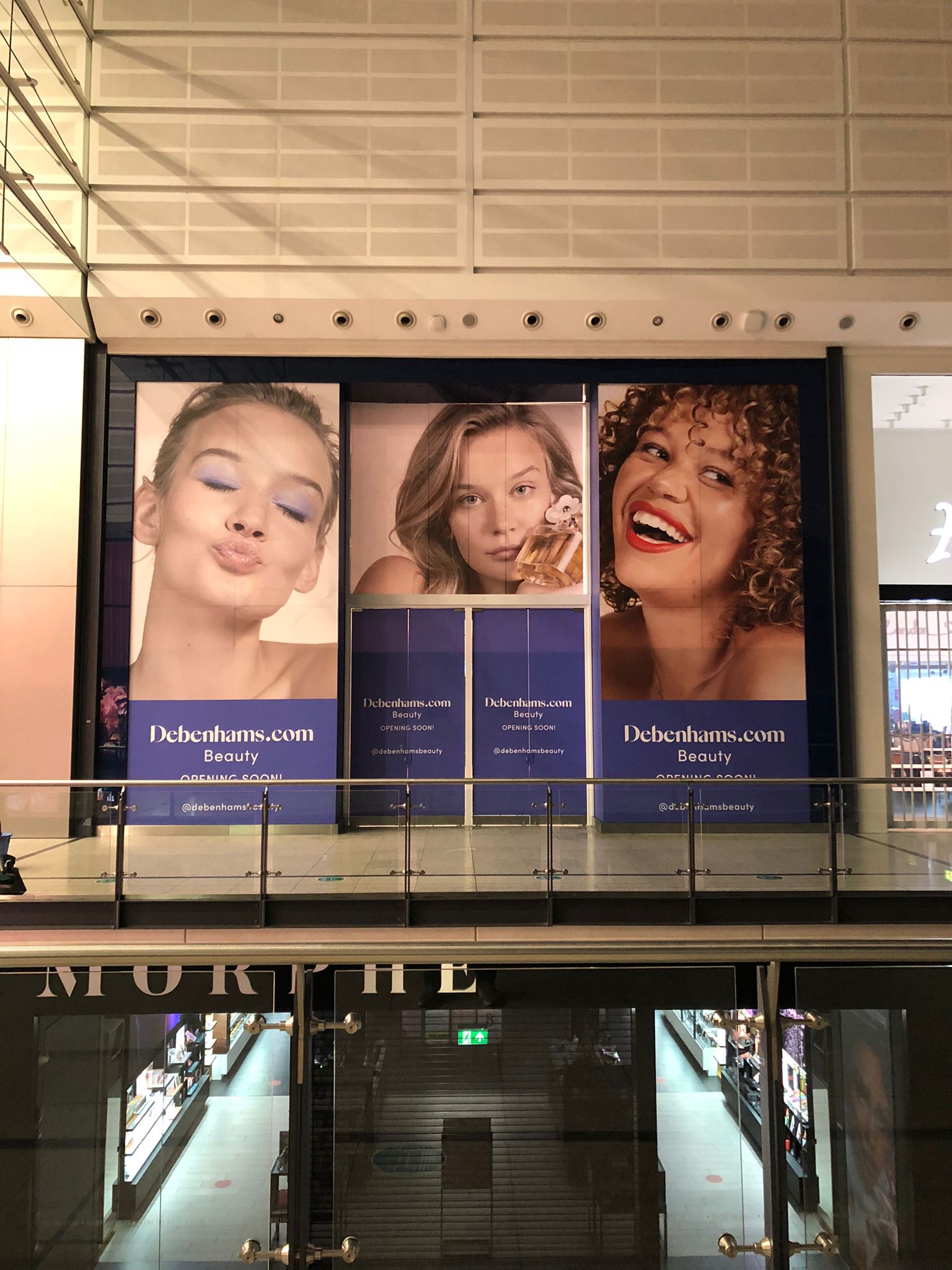 High street shop signage and window graphics produced by Backdrop Media